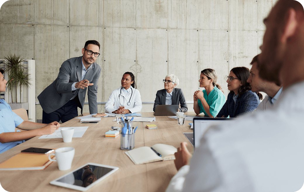 Team discussing strategy in conference room.