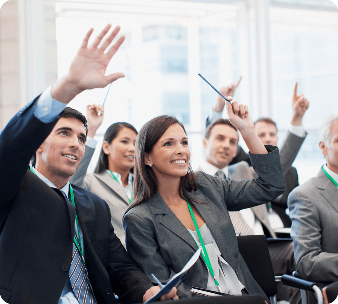 People participating in a conference session